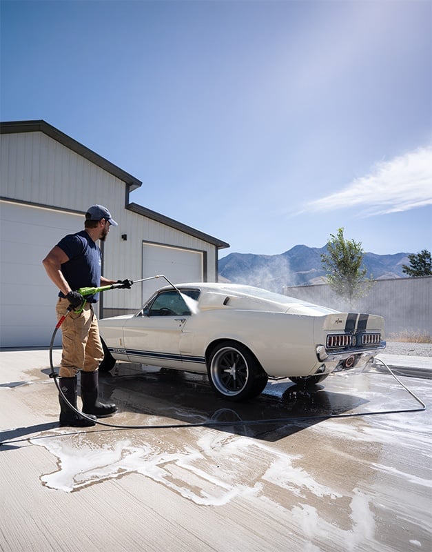 Before-and-after comparison of a car with a dirty and faded exterior versus a clean and polished one - Car Detailing Bozeman